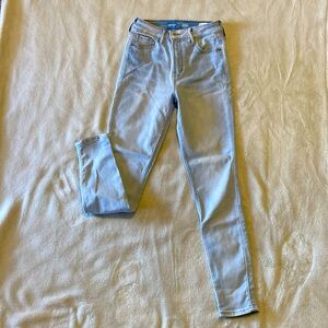 Woman’s Old Navy 360 Stretch High Rise Rockstar Super Skinny Jeans